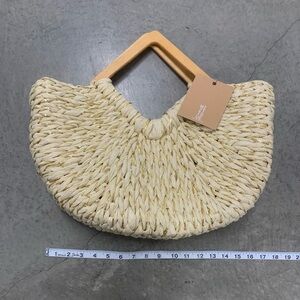Chic Straw Handbag with Gold accents and Wooden Handle